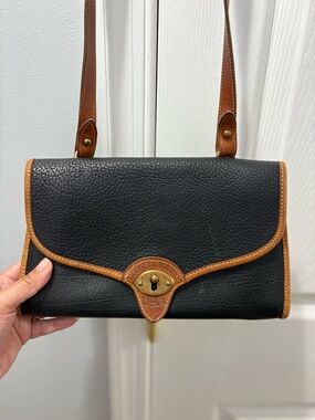 Dooney and Bourke R77 Cavalry Pouchette In Black- FLAWED Pre-owned Condition